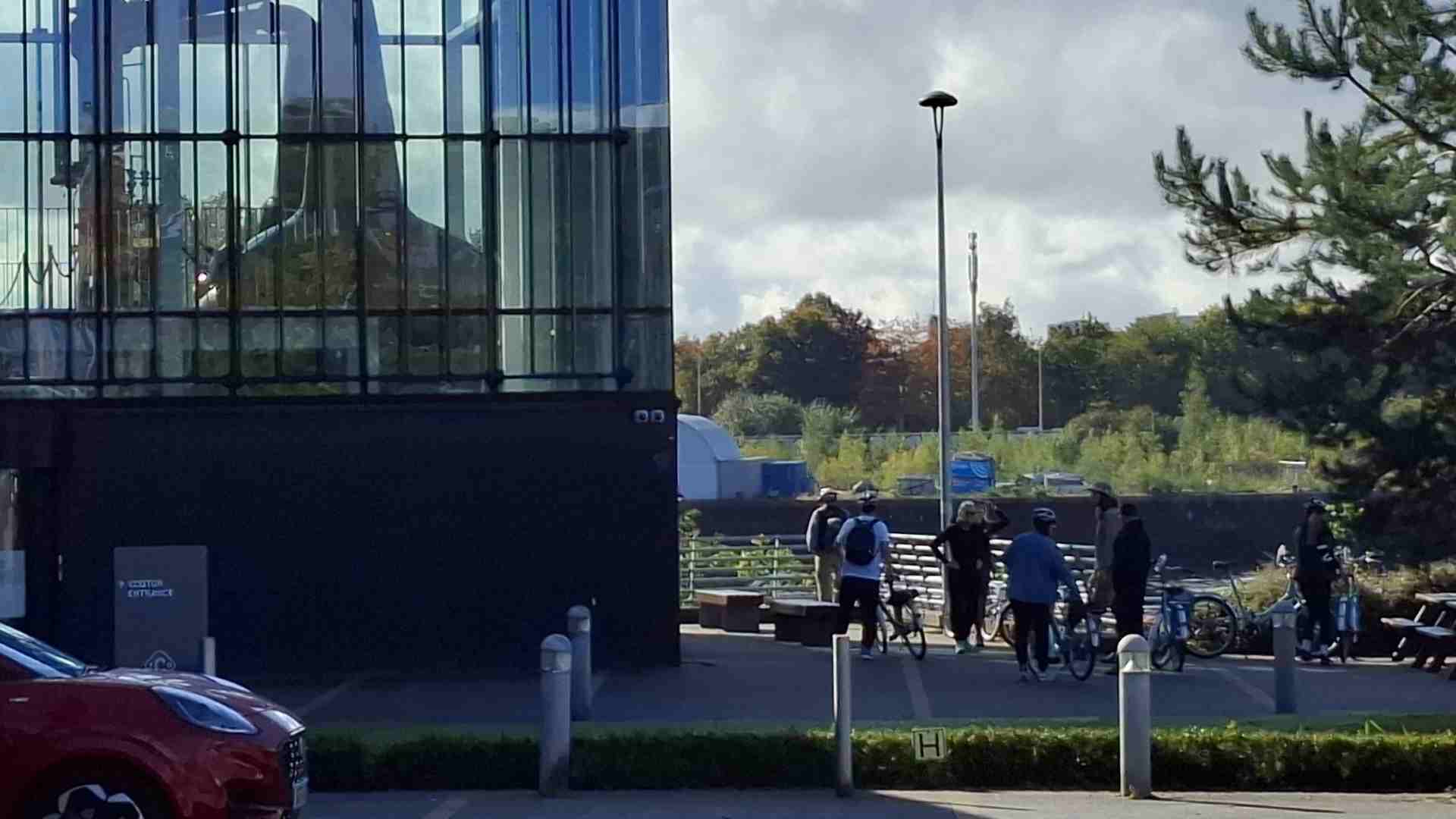 tour guide with cyclists at the Clydeside distillery Glasgow